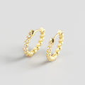 Pendientes de moda con hebilla de oreja salvaje con temperamento de diamante sinuoso y giro geométrico