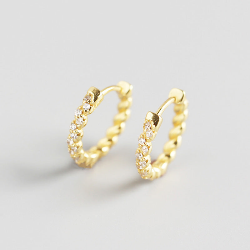 Pendientes de moda con hebilla de oreja salvaje con temperamento de diamante sinuoso y giro geométrico