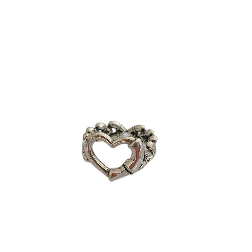 Anillo de cadena negro en forma de corazón hueco de Corea del Sur al por mayor