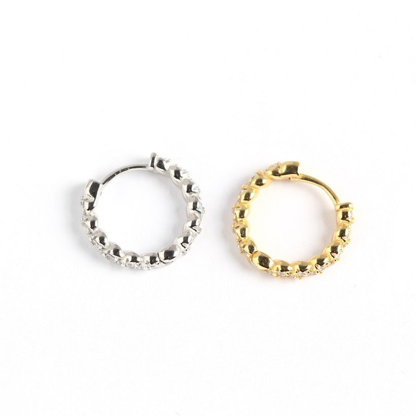 Pendientes de moda con hebilla de oreja salvaje con temperamento de diamante sinuoso y giro geométrico