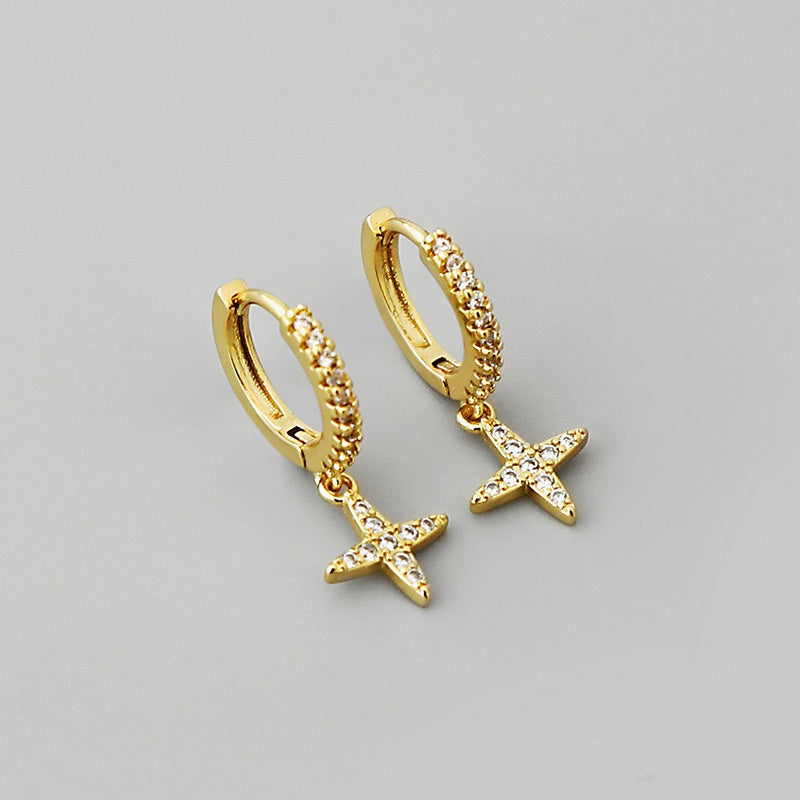 Pendientes de oro laminado con colgante de estrella cruzada brillante a la moda al por mayor