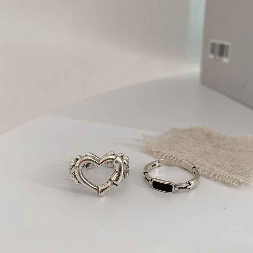 Anillo de cadena negro en forma de corazón hueco de Corea del Sur al por mayor