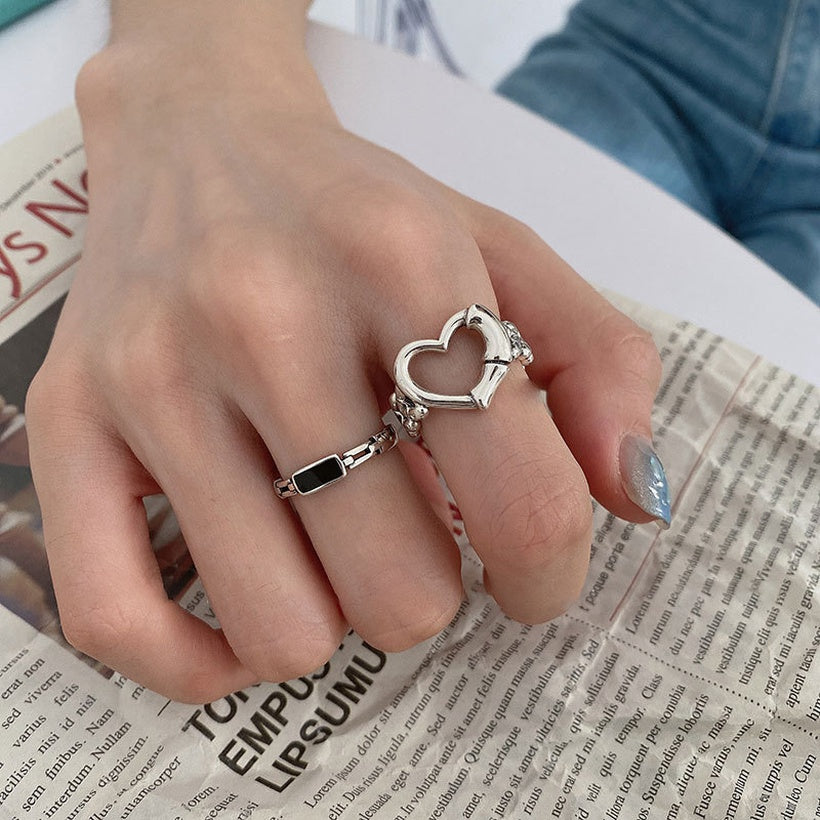 Anillo de cadena negro en forma de corazón hueco de Corea del Sur al por mayor