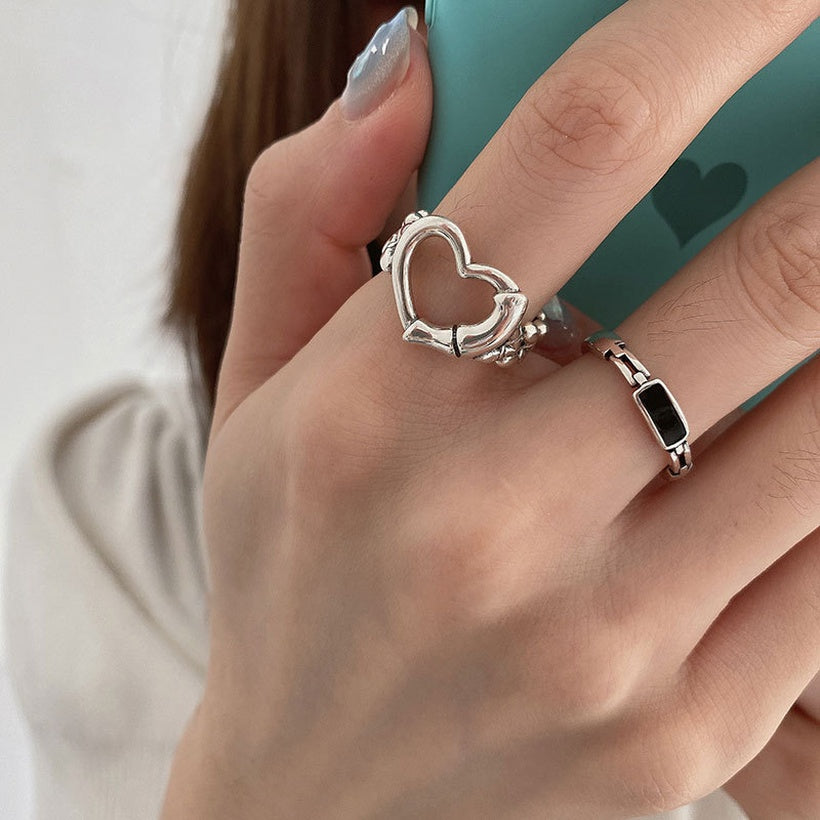 Anillo de cadena negro en forma de corazón hueco de Corea del Sur al por mayor