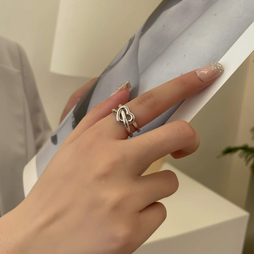 Moda Simple a la moda ahueca hacia fuera el cordón para trenzar el anillo femenino creativo nuevo amor Cruz chica anillo europeo y americano joyería