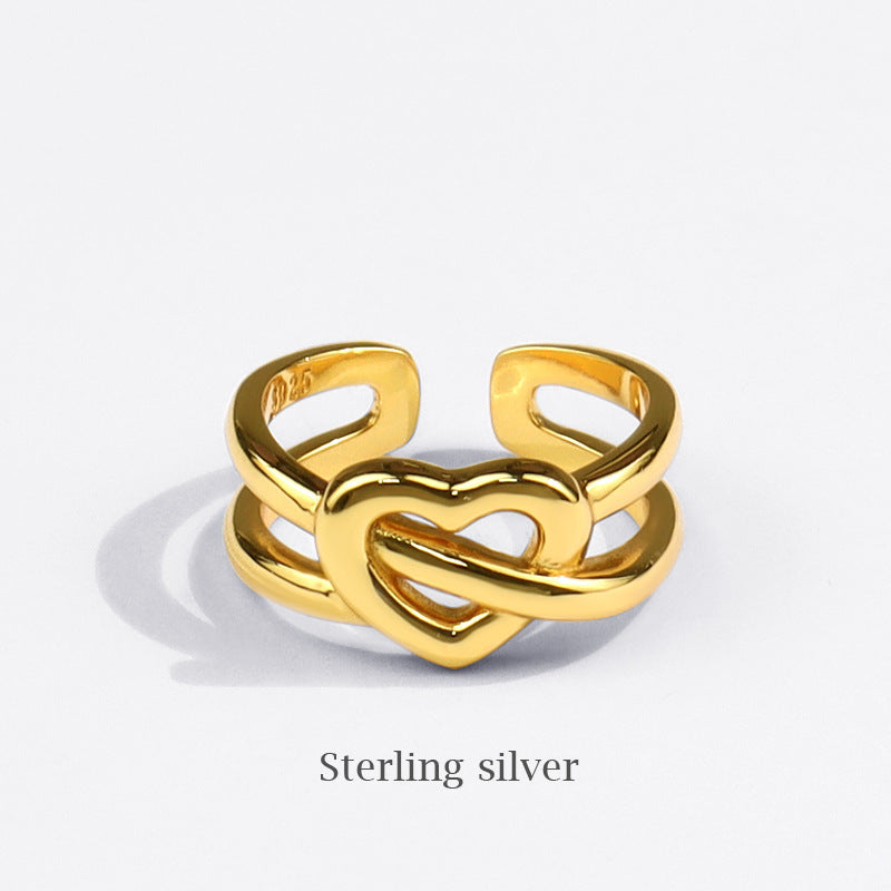 Moda Simple a la moda ahueca hacia fuera el cordón para trenzar el anillo femenino creativo nuevo amor Cruz chica anillo europeo y americano joyería