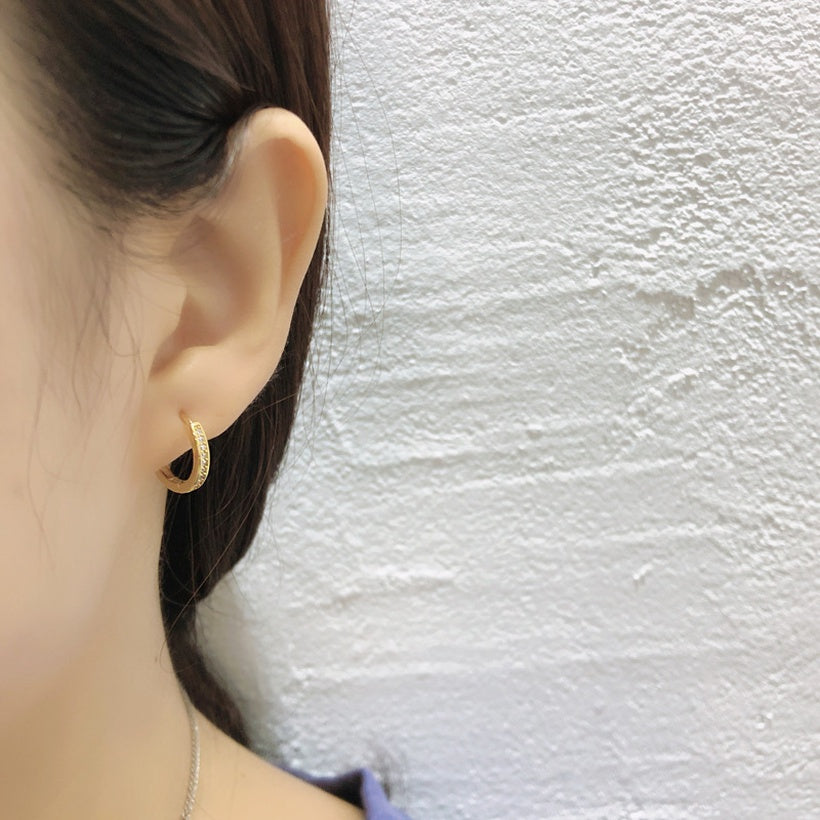 hebilla de oreja de oro laminado de circón redondo simple al por mayor