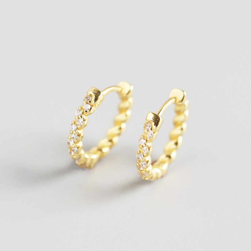 Pendientes de moda con hebilla de oreja salvaje con temperamento de diamante sinuoso y giro geométrico